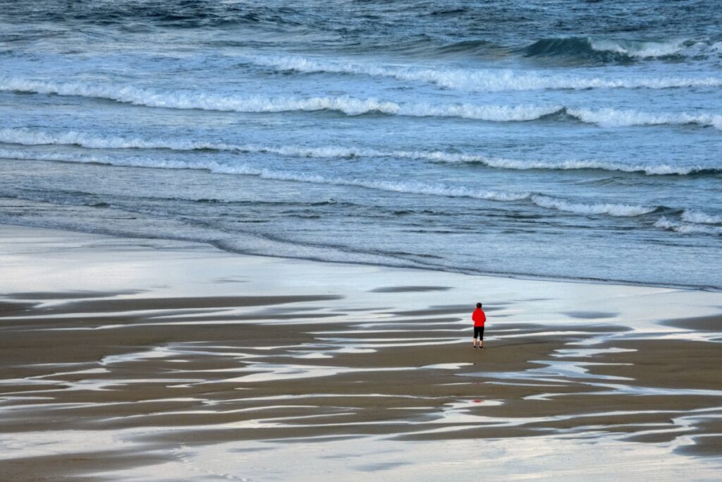 A woman by the shoreline in Cornwall. This was taken last year and seems so relevant in terms of self-isolation and social-distancing now required. image 15 1